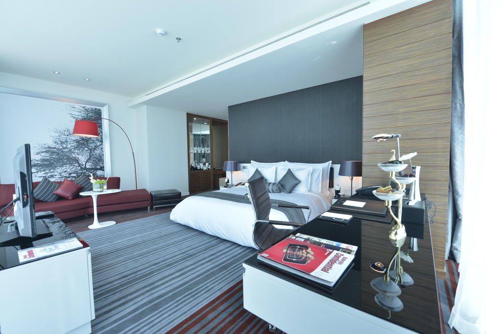 Ramee Grand Hotel And Spa Manama Rum bild A bedroom at the hotel